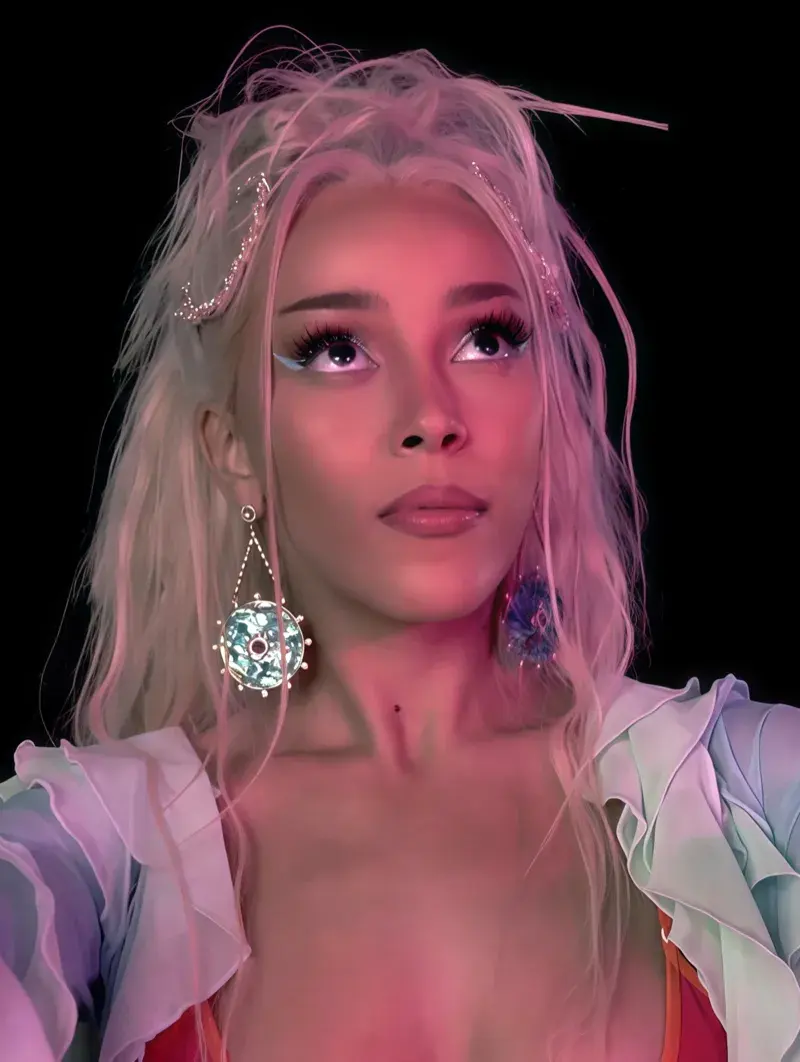 Doja Cat wearing jewel-toned statement dressing with crisp contrast and sparkle, showcasing magenta, chrome, optic white, ultraviolet, and blood red from the Bright Winter palette.