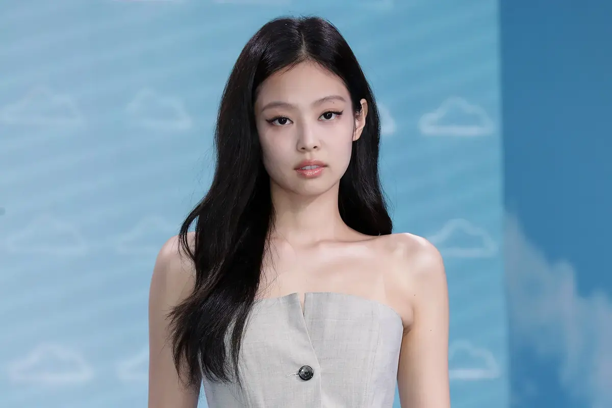 Jennie (BLACKPINK) — Bright Winter styling | Palette Hunt Editorial gallery of Jennie (BLACKPINK) styled in bright winter looks with electric blues, magenta accents, and polished black, highlighting electric cobalt, icy magenta, optic white, chrome silver, and inky black.