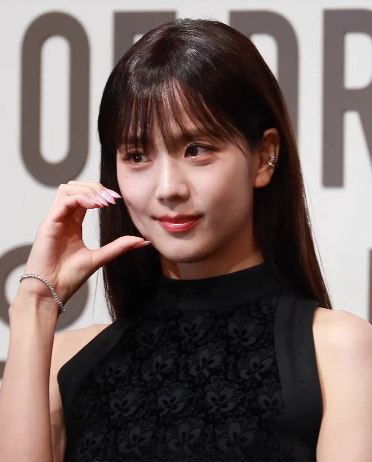Jisoo (BLACKPINK) wearing high-voltage winter ensembles with electric hues and chrome accents, showcasing fuchsia, royal blue, silver chrome, acid lime, and deep plum from the Vibrant Winter palette.