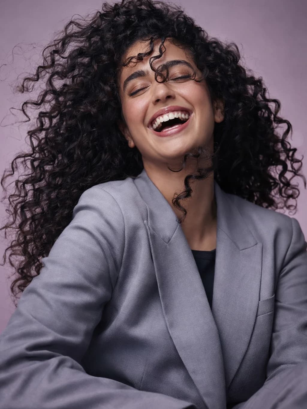 Woman comparing color swatches in Philadelphia 2