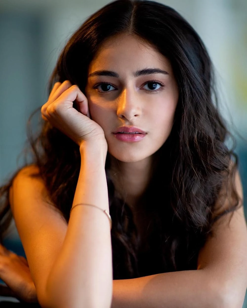 Editorial gallery of Ananya Panday styled in light summer outfits blending powder blues, lilac, and silvery neutrals, highlighting powder lilac, cool blush, opal gray, sky blue, and soft navy.